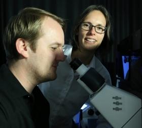 Professor Kat Gaus and postdoctoral student Dr Elvis Pandzic with one of the super-resolution microscopes at UNSW's Centre in Single Molecule Science