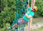 Enrico Klotsch climbing a rope net (Photo Carola Benzing)